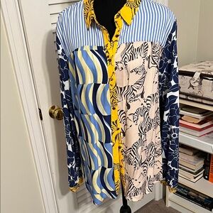 Anthropologie Blue and Yellow Patterned women’s shirt size L.